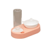 Pink and white pet water and food bowl set on a white background