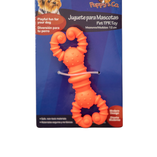 Orange dog toy with packaging featuring 'Puppy & Co' branding on a white background.