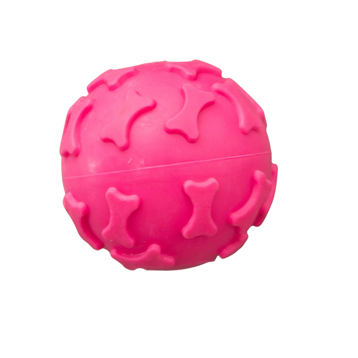 Pink textured ball with bone designs on a white background